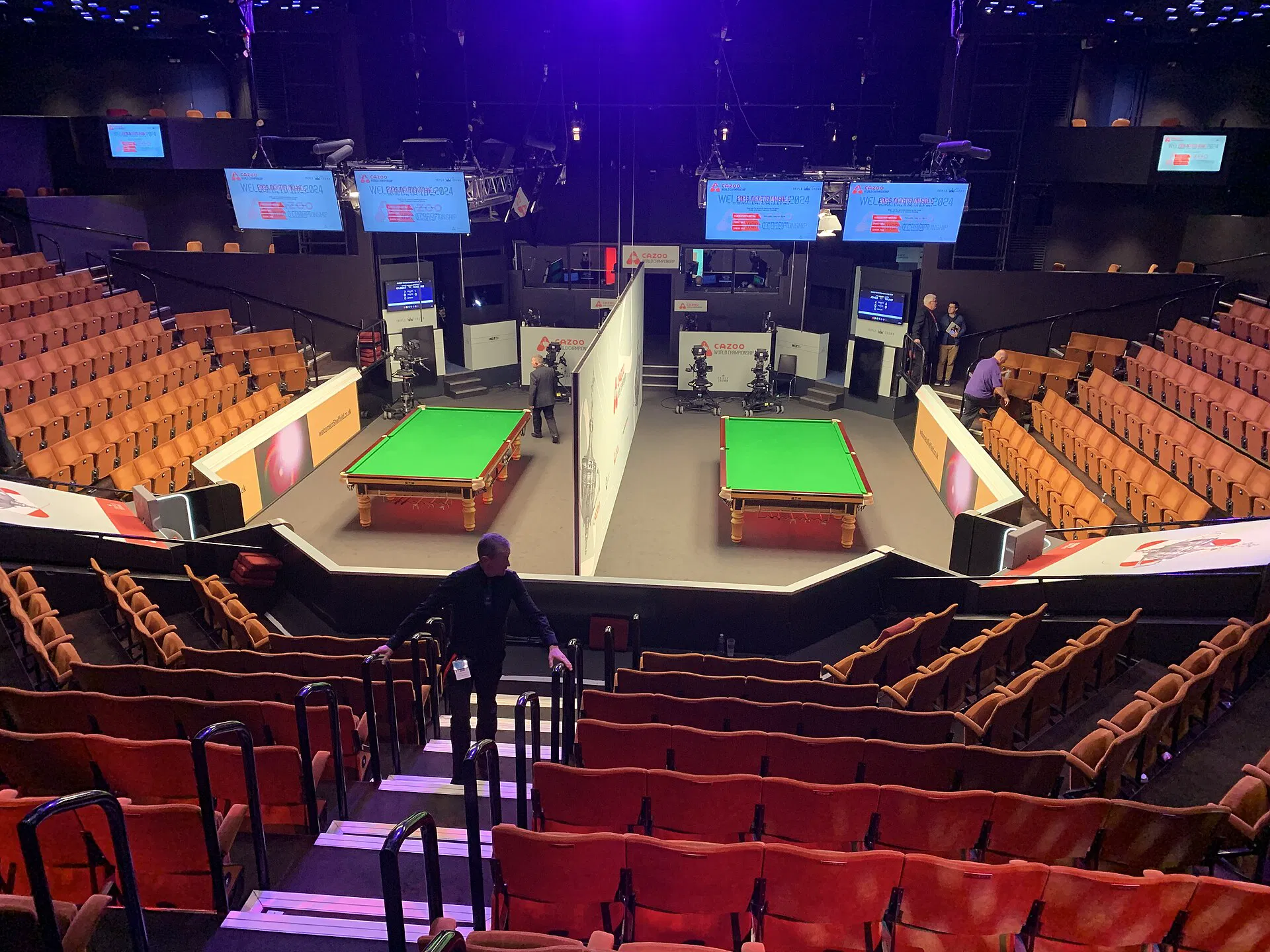 Championship arena under the lights (Wikimedia Commons)