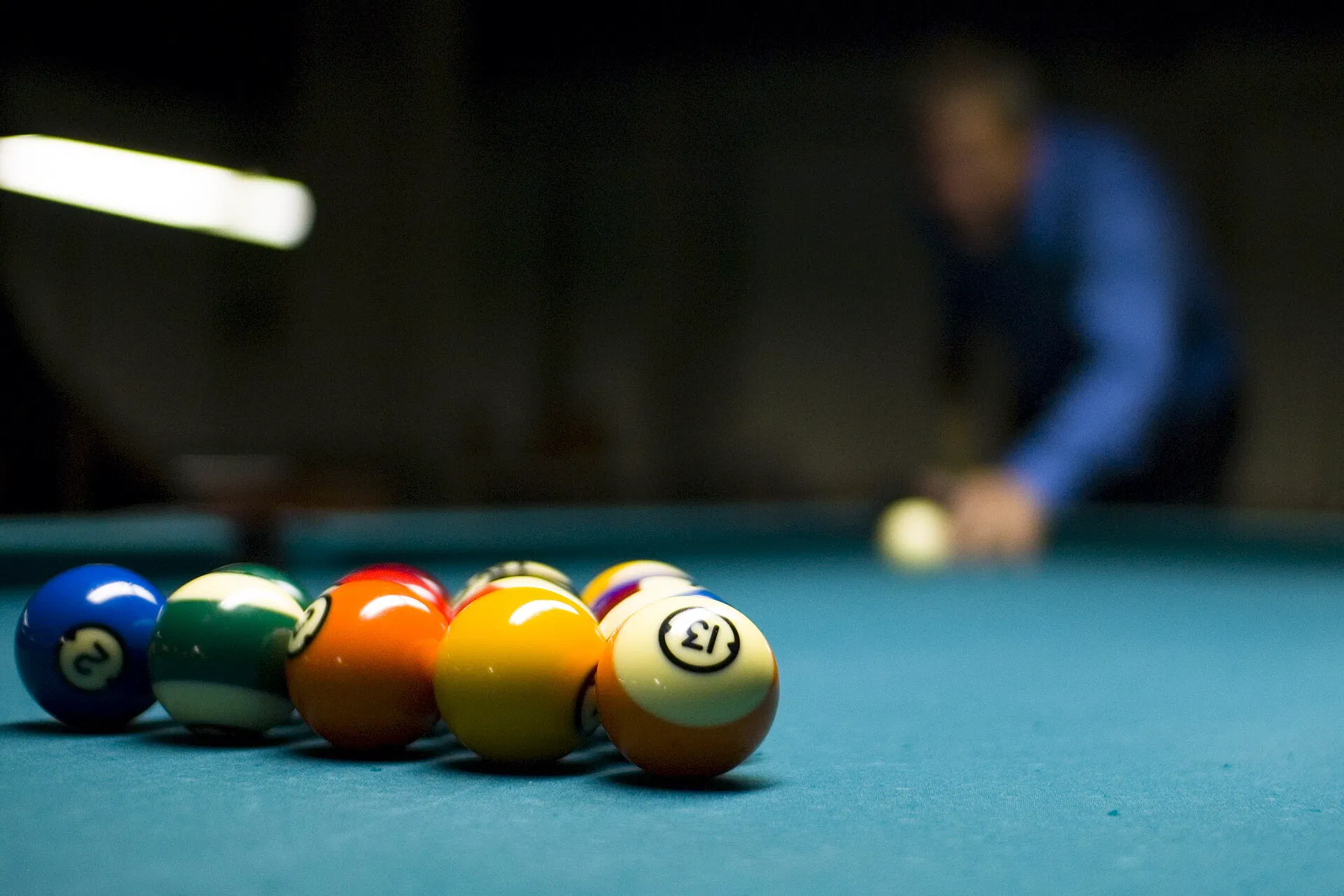 The 8-ball break at the start of a rack (Wikimedia Commons)